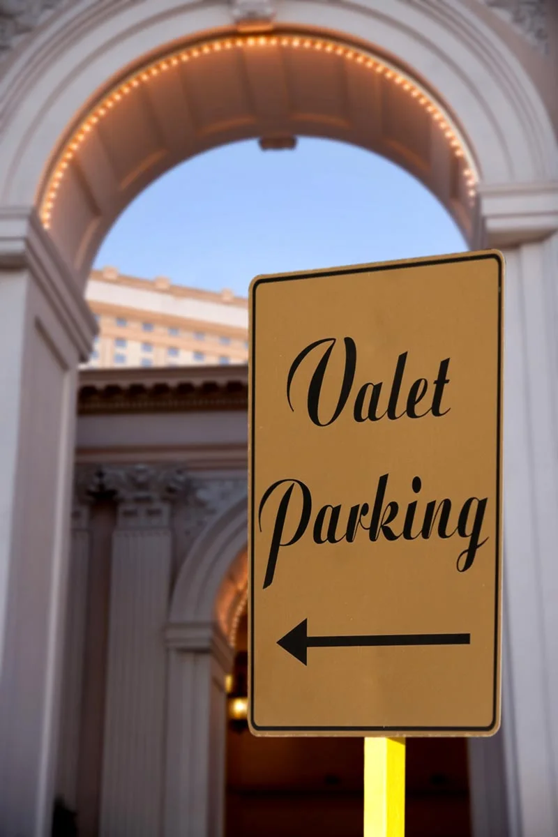 Valet parking directional sign at an event entrance