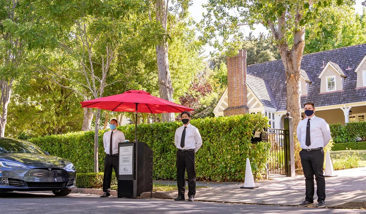 Valet attendants ready at a private event entrance